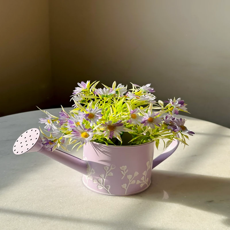 metal flower bucket with flower