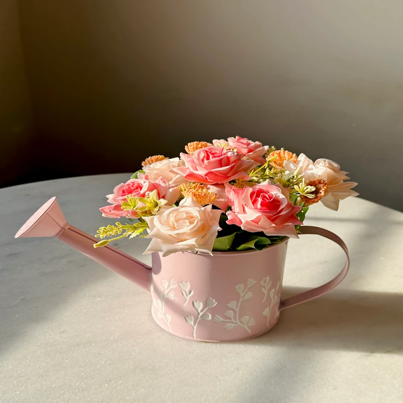 metal flower bucket with flower bunch